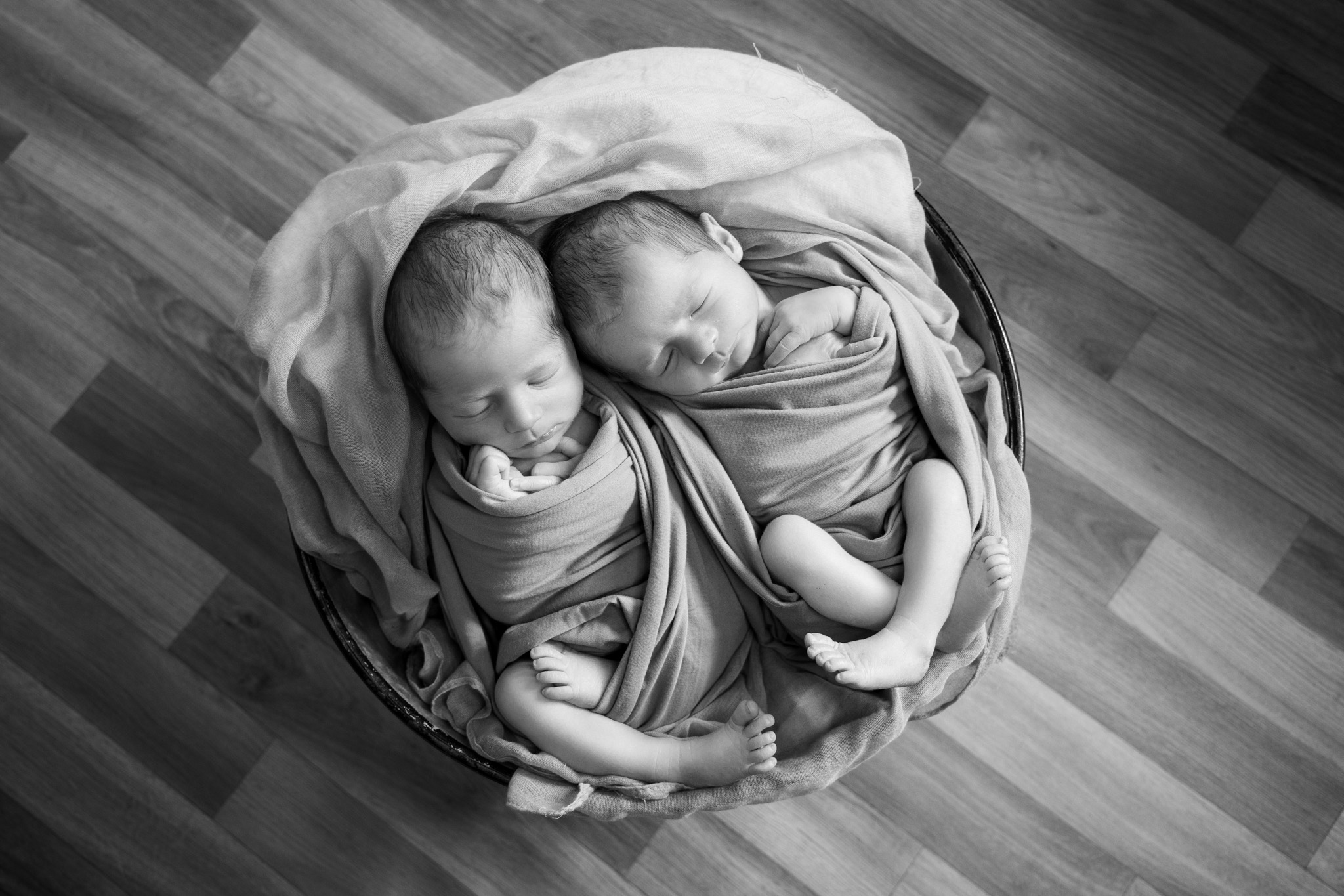 Hampshire newborn photographer NK Photography baby photos hampshire (3) black and white posed twin newborn photo - newborn photographer Hampshire baby photos NK Photography