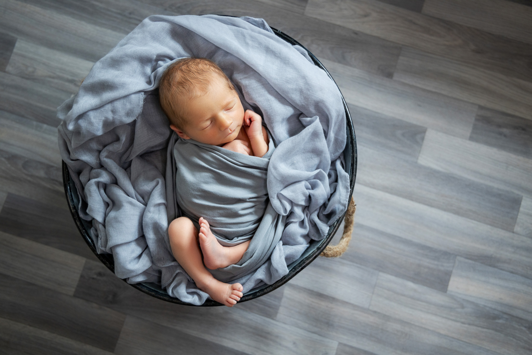 Hampshire newborn photographer NK Photography baby photos hampshire (4) newborn posed photo blue blanket - newborn photographer Hampshire baby photos NK Photography