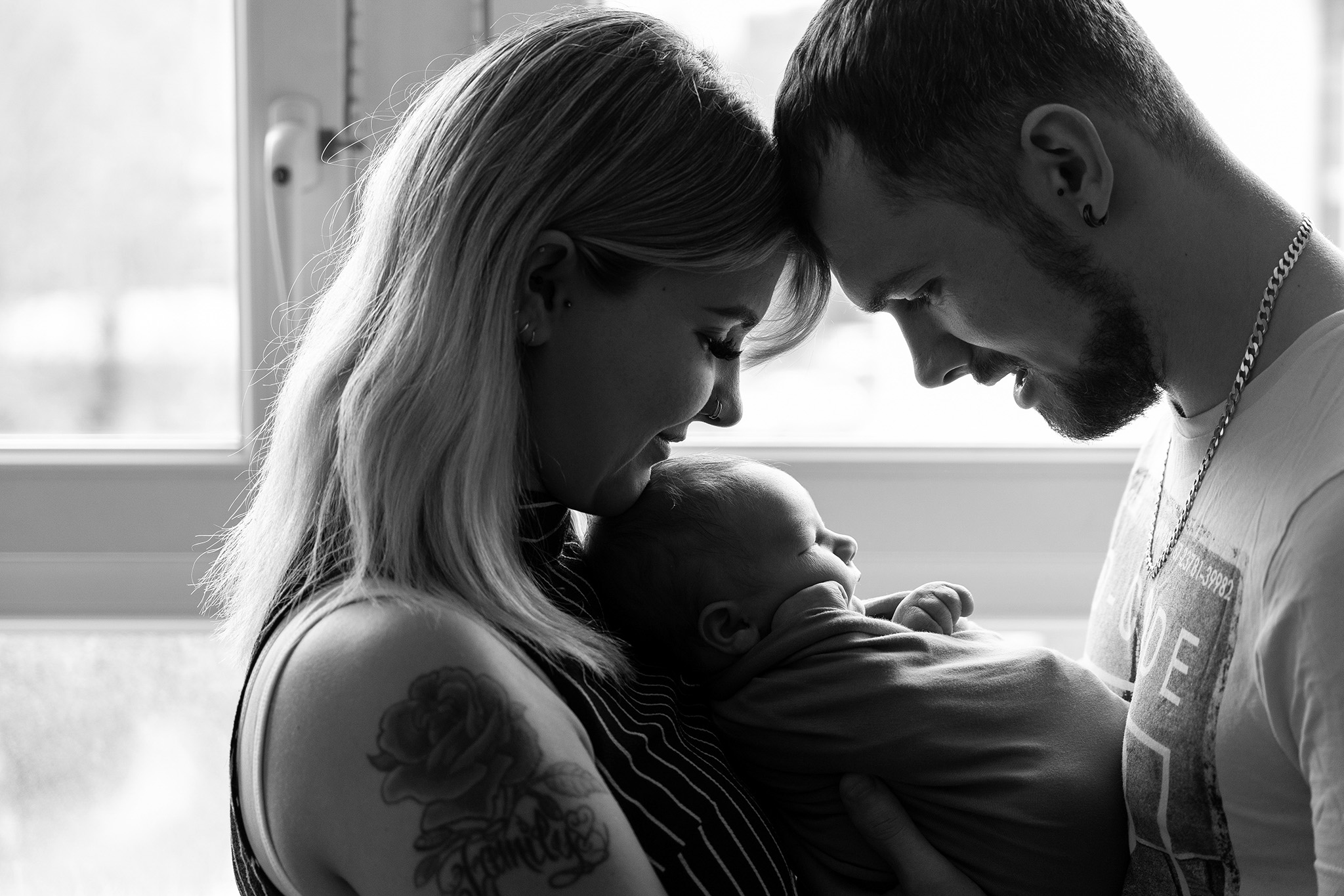 Hampshire newborn photographer NK Photography baby photos hampshire (7) parents holding baby - newborn photographer Hampshire baby photos NK Photography