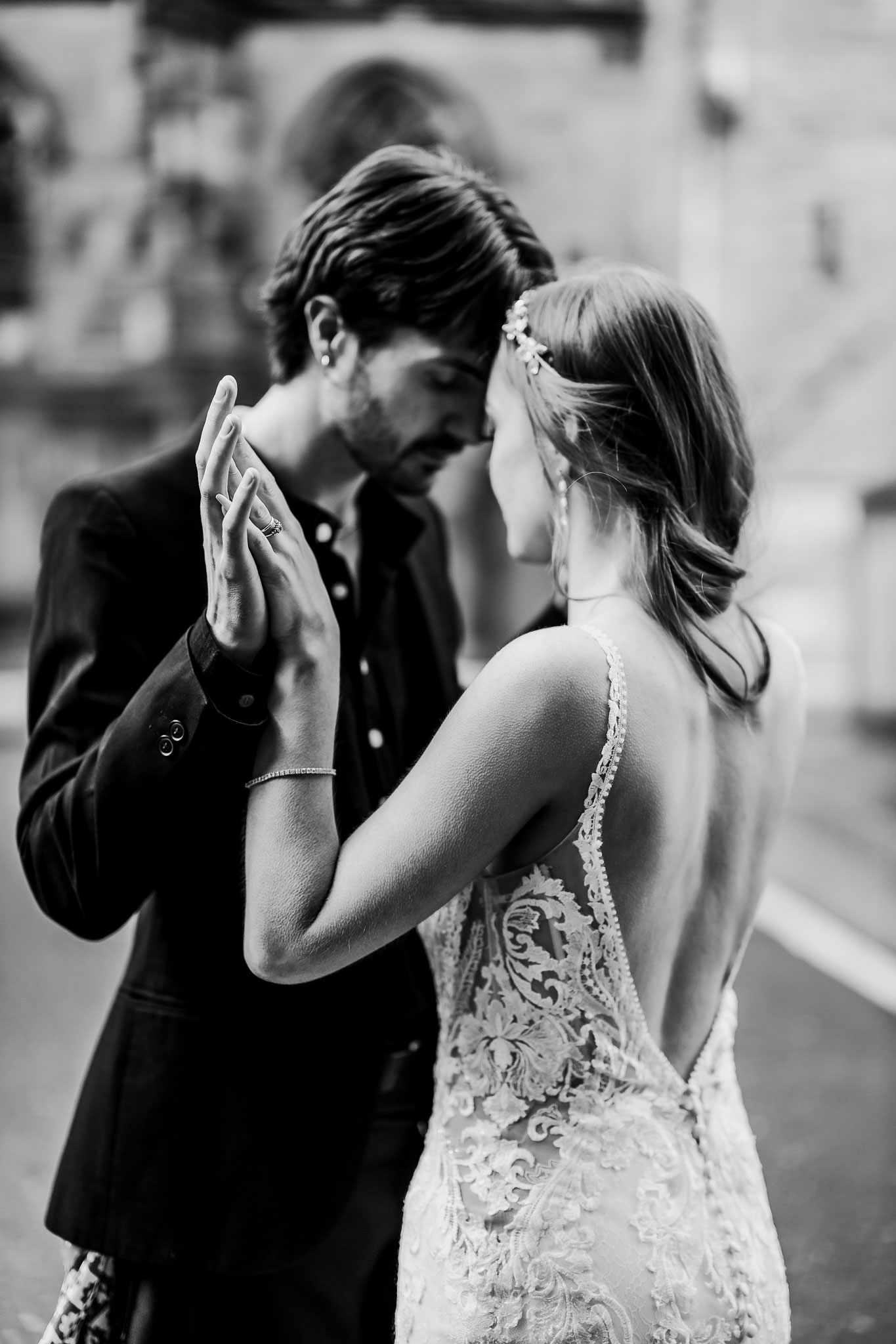 destination wedding photographer a Scottish couple facing eacother holding hands