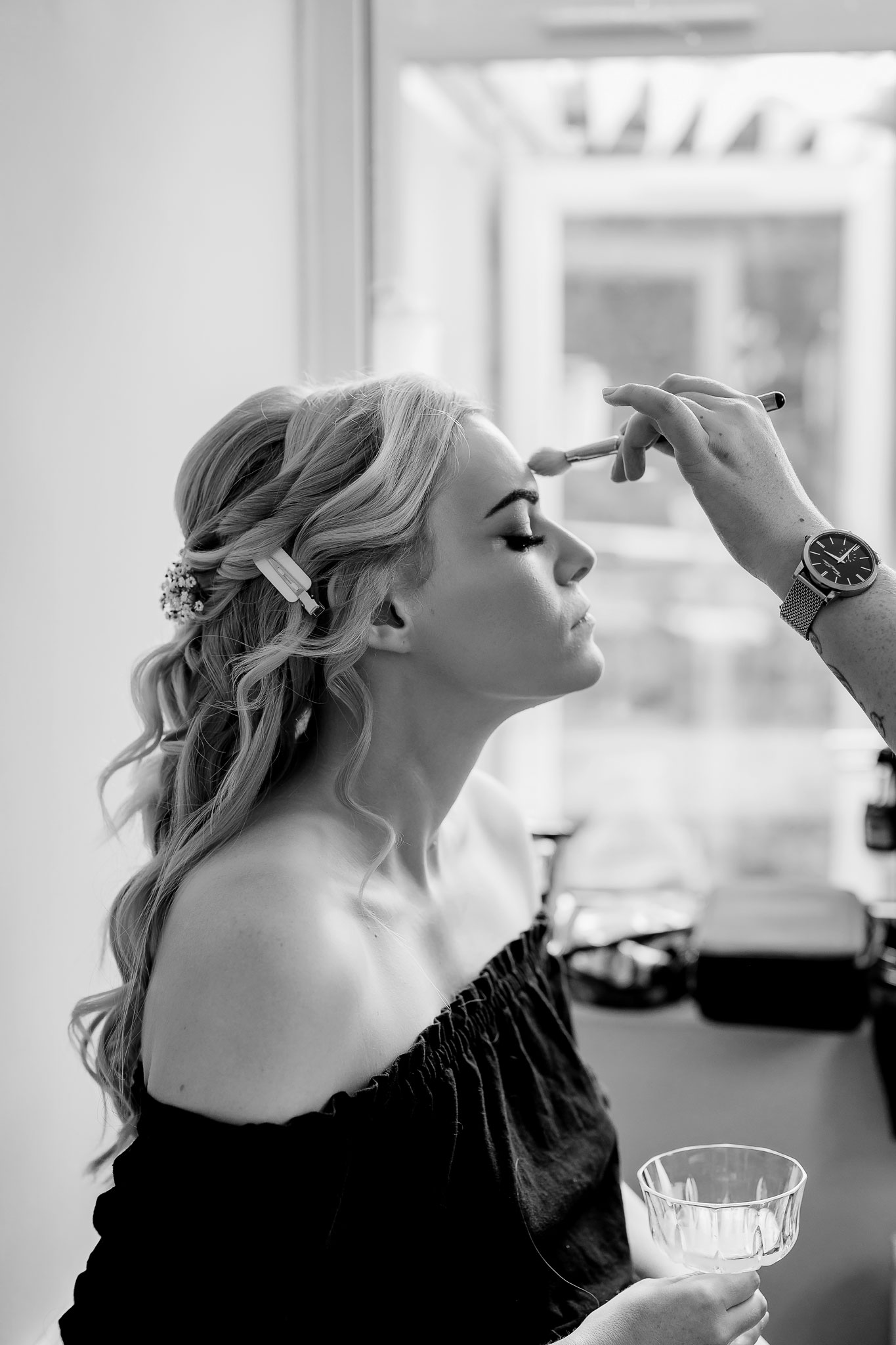 the bride having her make up done