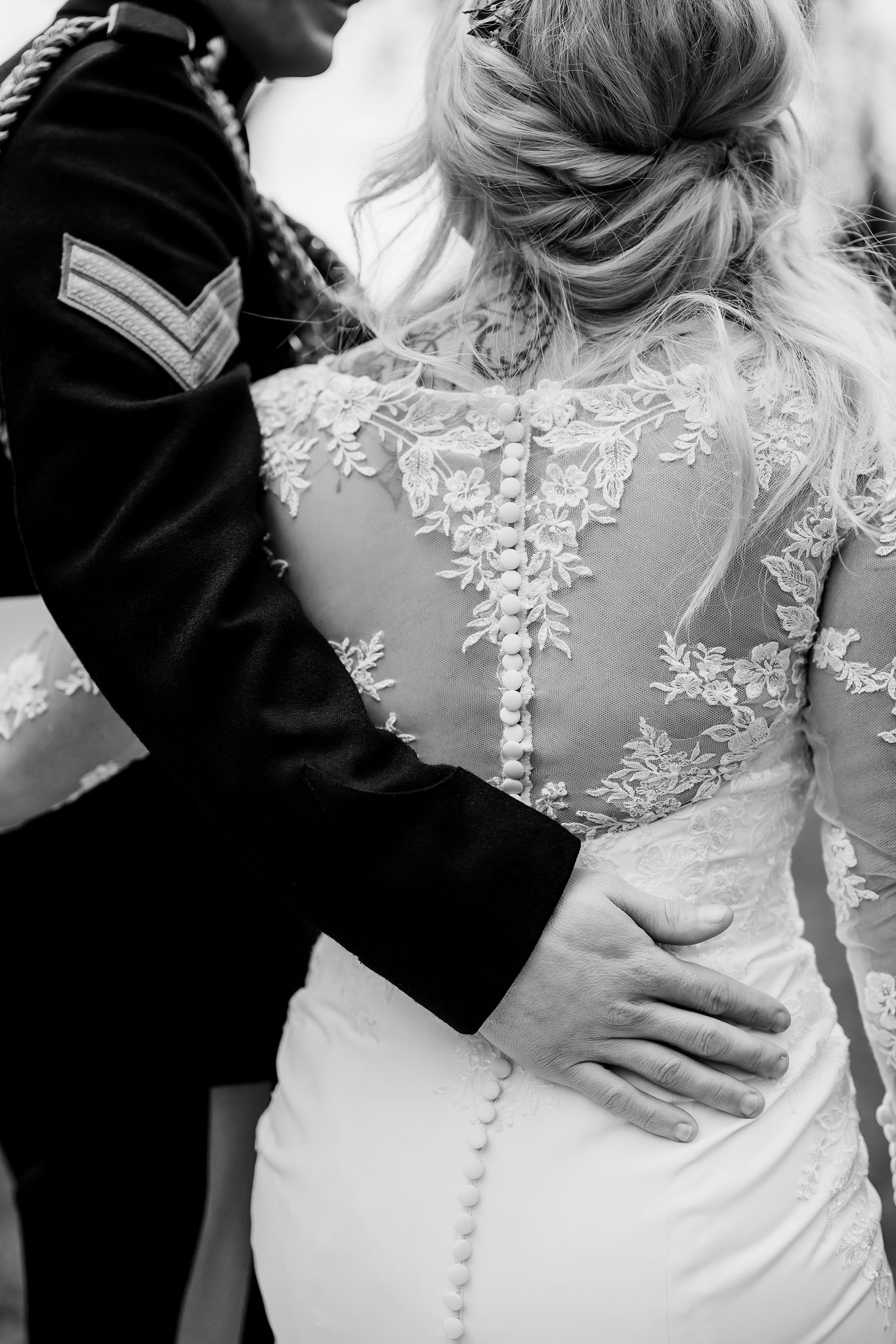 a monochrome image of the bride and groom