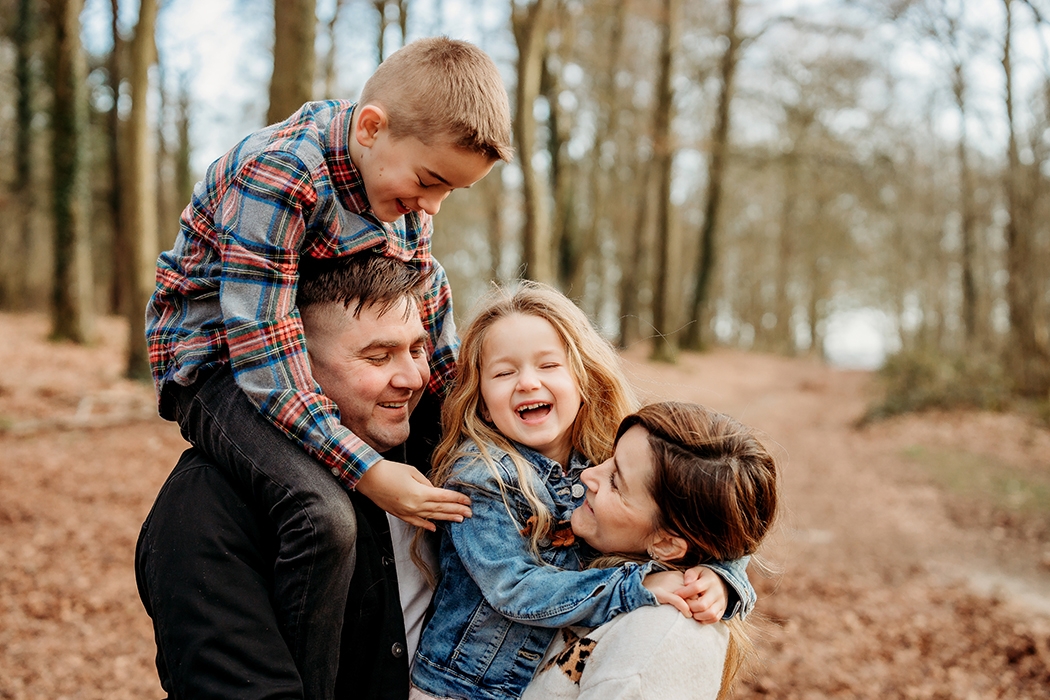The Allum Family family photo in the woods