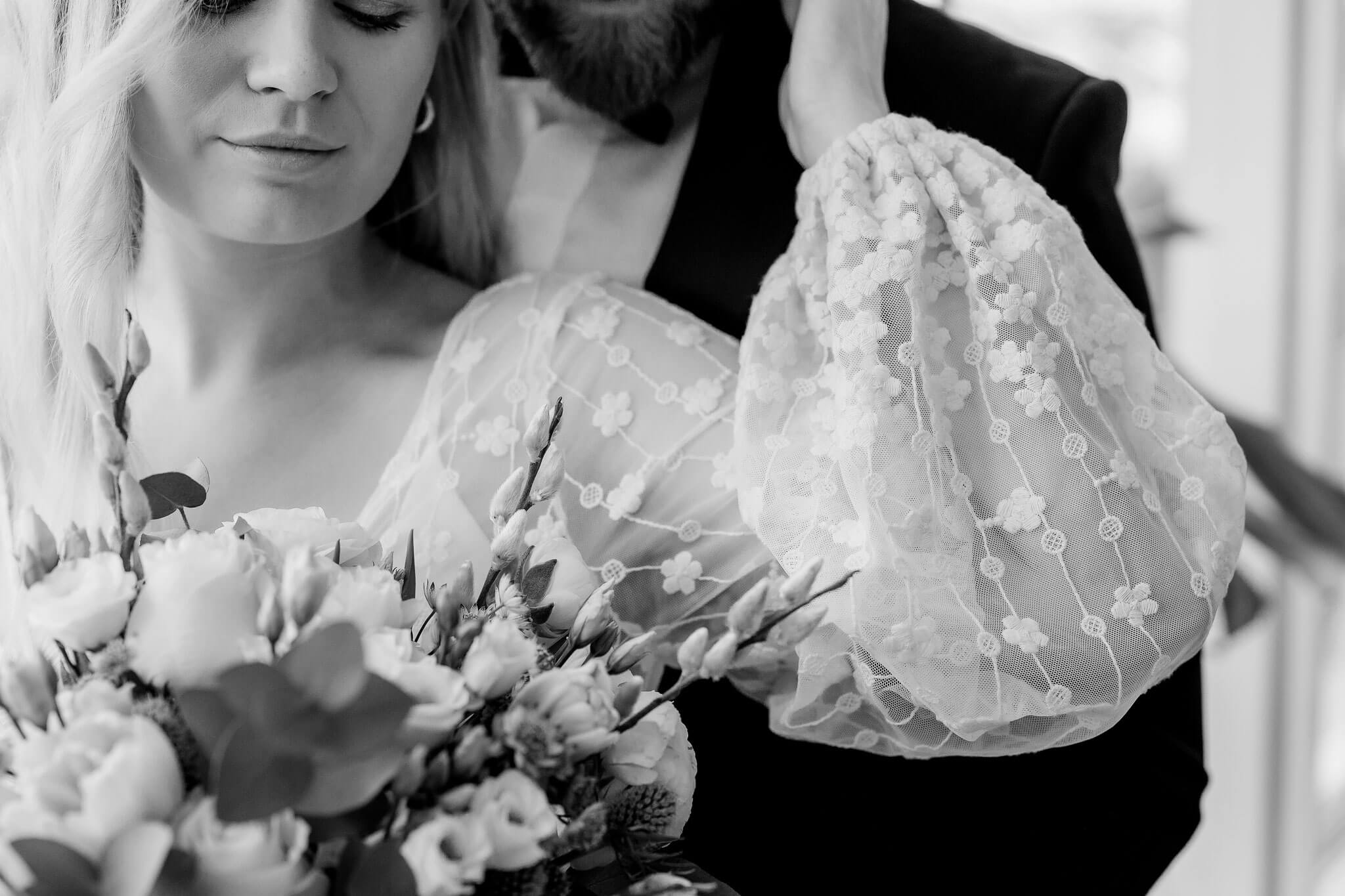 a monochrome photo of a bride and groom