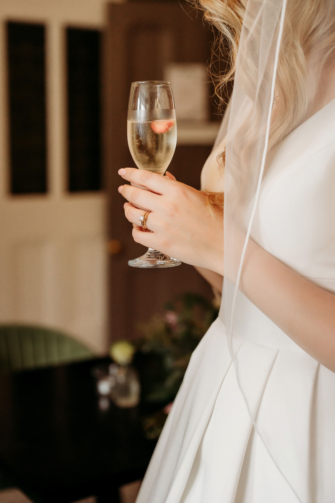 bride holding her champagne glass