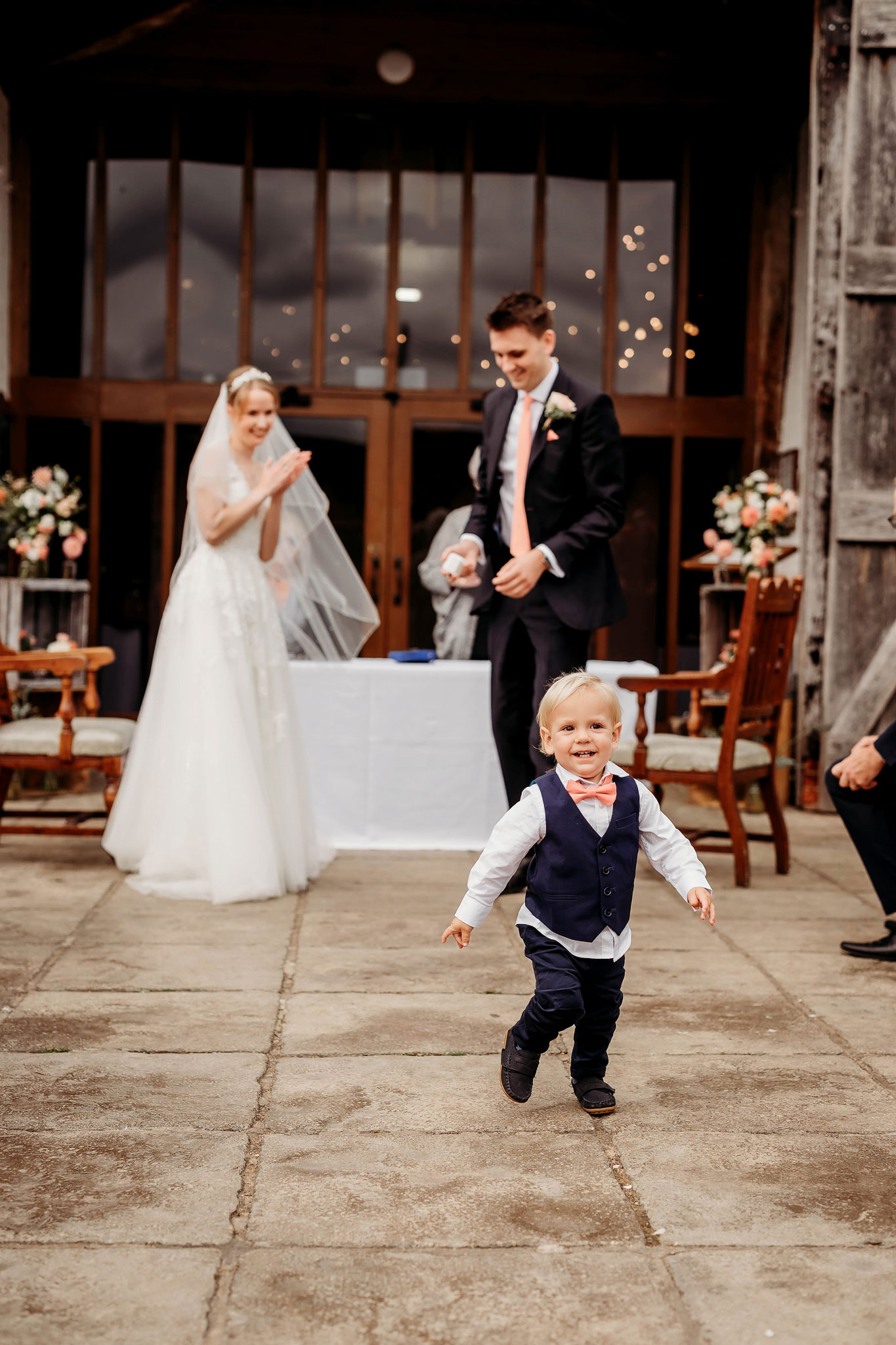 the sound ring bearer running towards the camera