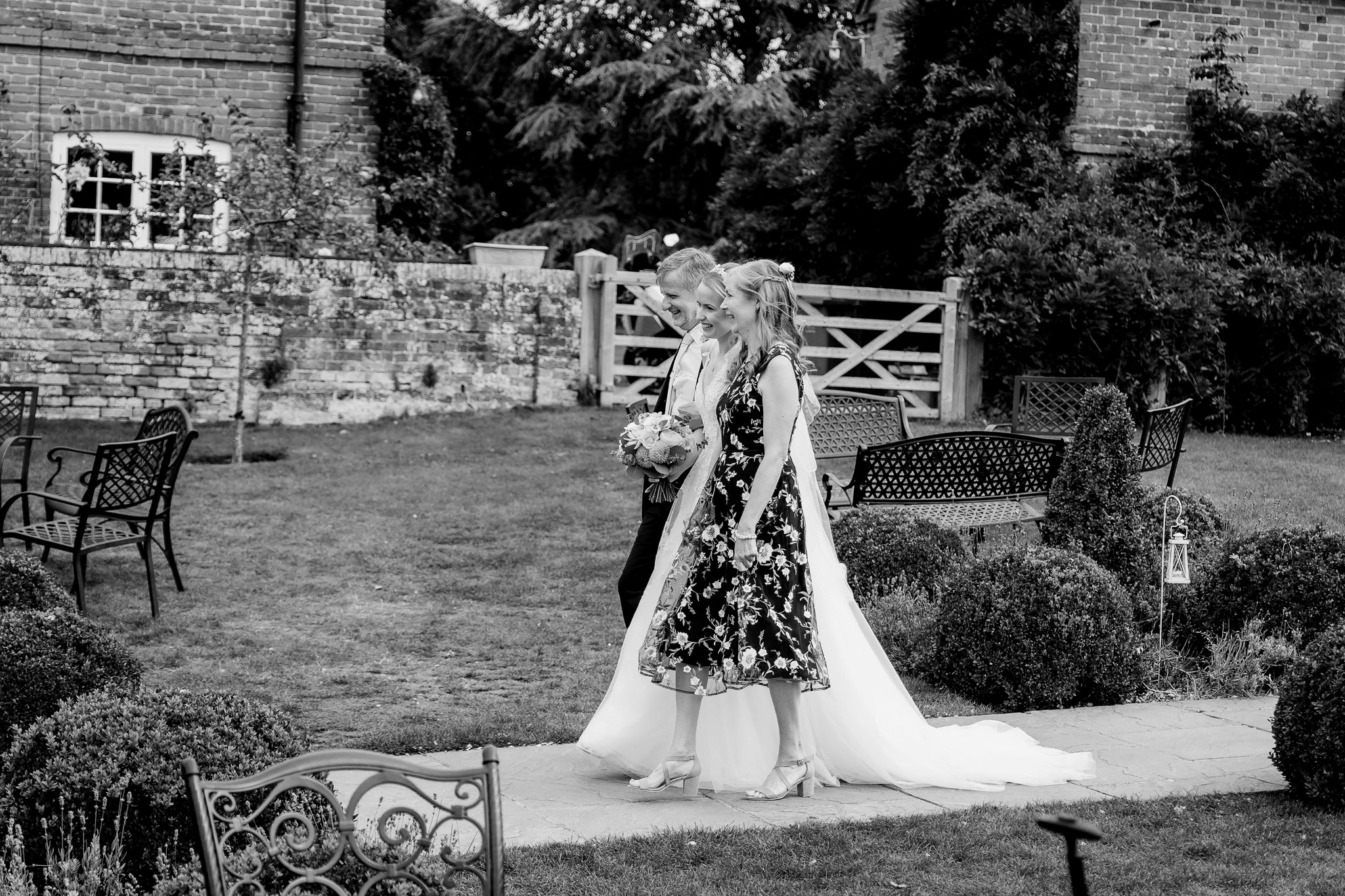 Elly walking down the aisle at ufton court