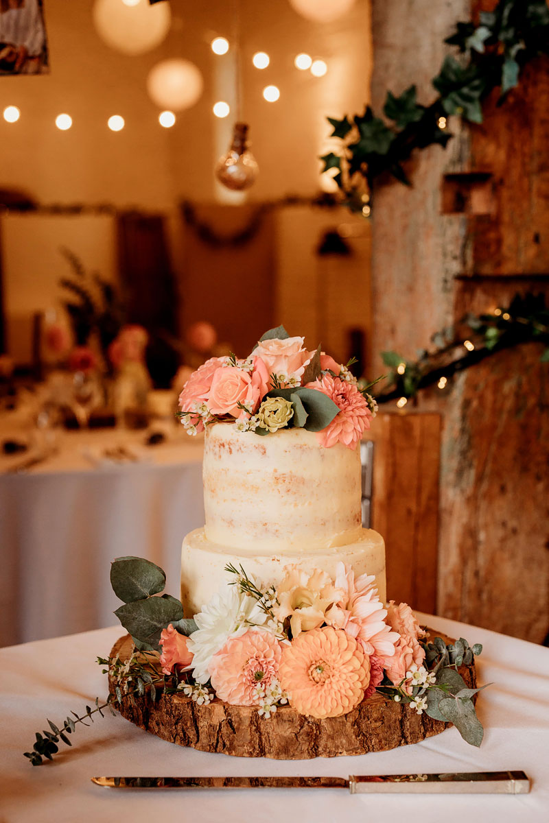 the peach colour wedding cake inside ufton court