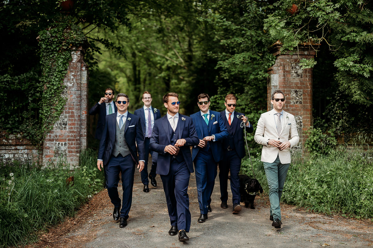 a small group of groomsmen for wedding photos