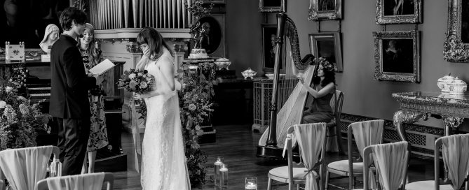 bride and groom reading vows
