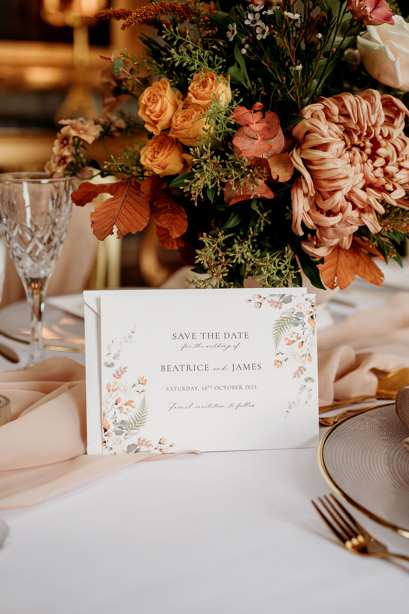 an wedding invitation for an autumn wedding