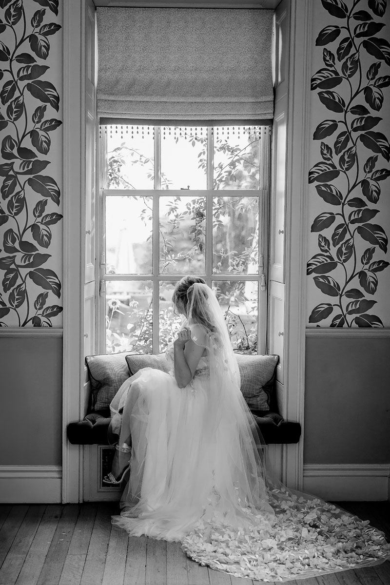 bride looking out of a window