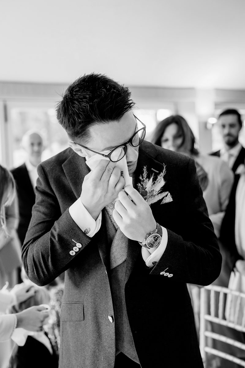 a groom getting emotional seeing his bride at his hampshire wedding