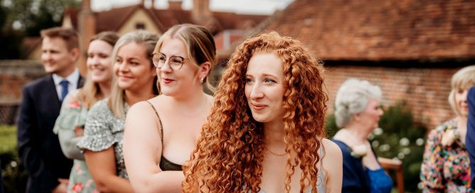 a photo of the wedding guest taken by a second shooter