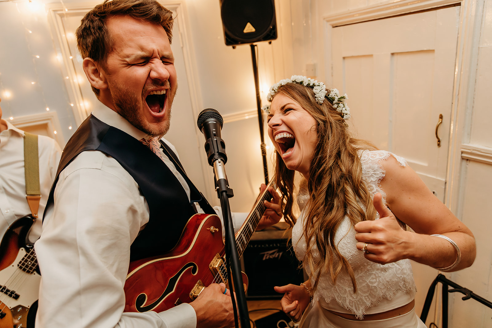 bride and groom singing