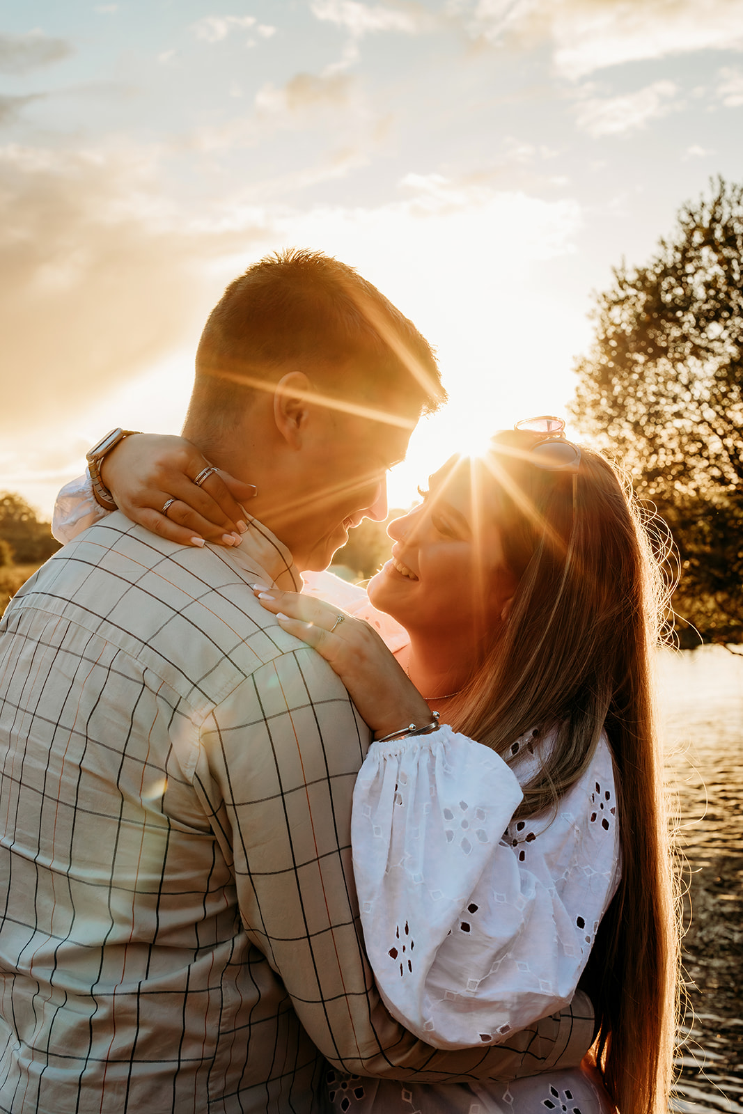 couple looking at each other at golden hour