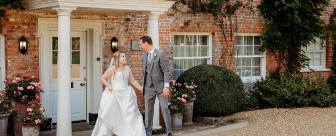 bride and groom walking outside syrencot