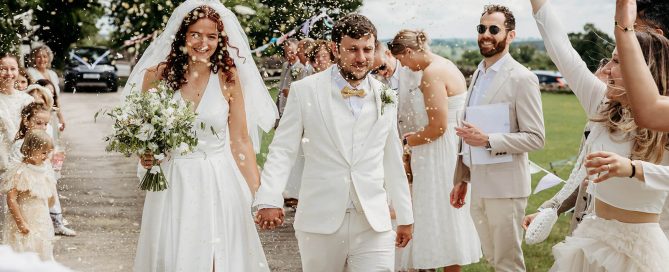 a confetti photo with the white wedding guests